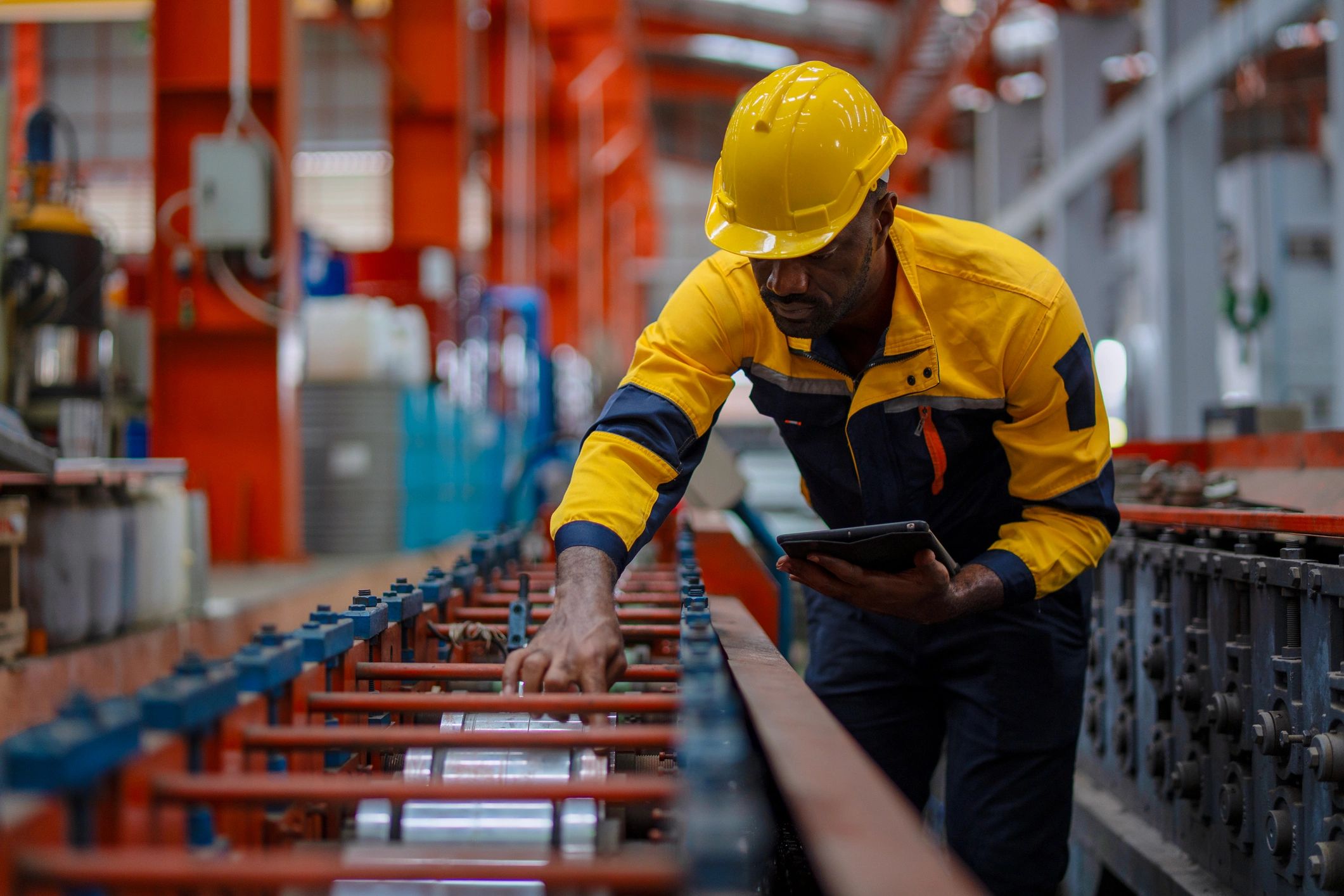 Technician working in an industrial electrical environment